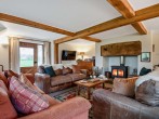 Comfortable sofas and wood burner Comfortable sofas and wood burner