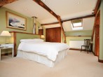 Twin bedroom in the lower barn with gorgeous countryside views