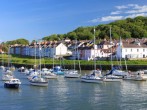 Explore Aberaeron with its harbour, independent shops, and eateries Explore Aberaeron with its harbour, independent shops, and eateries