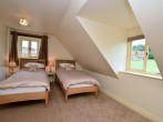 Twin bedroom with countryside views Twin bedroom with countryside views