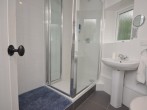 En-suite shower room located on ground floor En-suite shower room located on ground floor