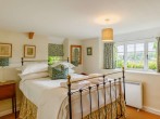 Charming double bedroom overlooking the garden and countryside beyond