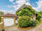 View towards the rear of this charming thatched cottage