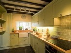Creatively designed and well equipped kitchen Creatively designed and well equipped kitchen
