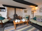 Enjoy creature comforts with underfloor heating, wood burner and TV