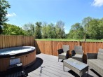 The private and enclosed decking with hot tub The private and enclosed decking with hot tub