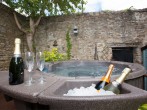 Secluded walled garden with hot tub Secluded walled garden with hot tub