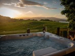 Relax in the private hot tub and admire the views Relax in the private hot tub and admire the views