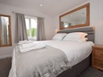 The stylish super-king-size bedroom with ample storage space and Smart TV The stylish super-king-size bedroom with ample storage space and Smart TV