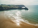Explore Three Cliffs Bay with its wonderful views and meandering river Explore Three Cliffs Bay with its wonderful views and meandering river