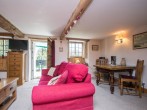 The exposed beams are throughout the whole of the beautiful cottage The exposed beams are throughout the whole of the beautiful cottage