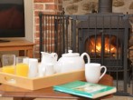 Relax by the cosy wood burner