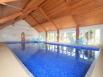 Large indoor heated swimming pool perfect for exercise or family fun Large indoor heated swimming pool perfect for exercise or family fun