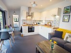 Stylish kitchen and dining space, with bi-folding doors offering fabulous views Stylish kitchen and dining space, with bi-folding doors offering fabulous views