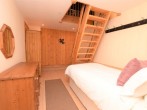 Quirky third bedroom with access up to the den Quirky third bedroom with access up to the den