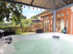 Sit and relax in the sheltered hot tub further where views can be enjoyed from here Sit and relax in the sheltered hot tub further where views can be enjoyed from here