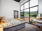Super king sized bedroom with feature floor to ceiling window and en-suite Super king sized bedroom with feature floor to ceiling window and en-suite