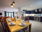 Open plan dining and kitchen is perfect for any social occasion Open plan dining and kitchen is perfect for any social occasion