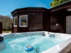 Relax in the hot tub with stunning views Relax in the hot tub with stunning views