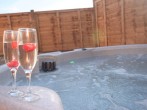 Indulge in the hot tub for some relaxation Indulge in the hot tub for some relaxation