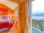 Step inside the double bedroom with amazing Loch Earn views Step inside the double bedroom with amazing Loch Earn views