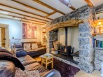 Beautiful stone cottage with exposed beams and feature fireplace Beautiful stone cottage with exposed beams and feature fireplace