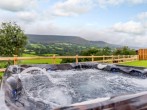 Relish the time spend in your very own private hot tub Relish the time spend in your very own private hot tub