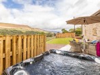 Enjoy the hot tub whatever the weather Enjoy the hot tub whatever the weather