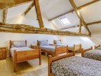 Mezzanine bedroom with six single beds Mezzanine bedroom with six single beds